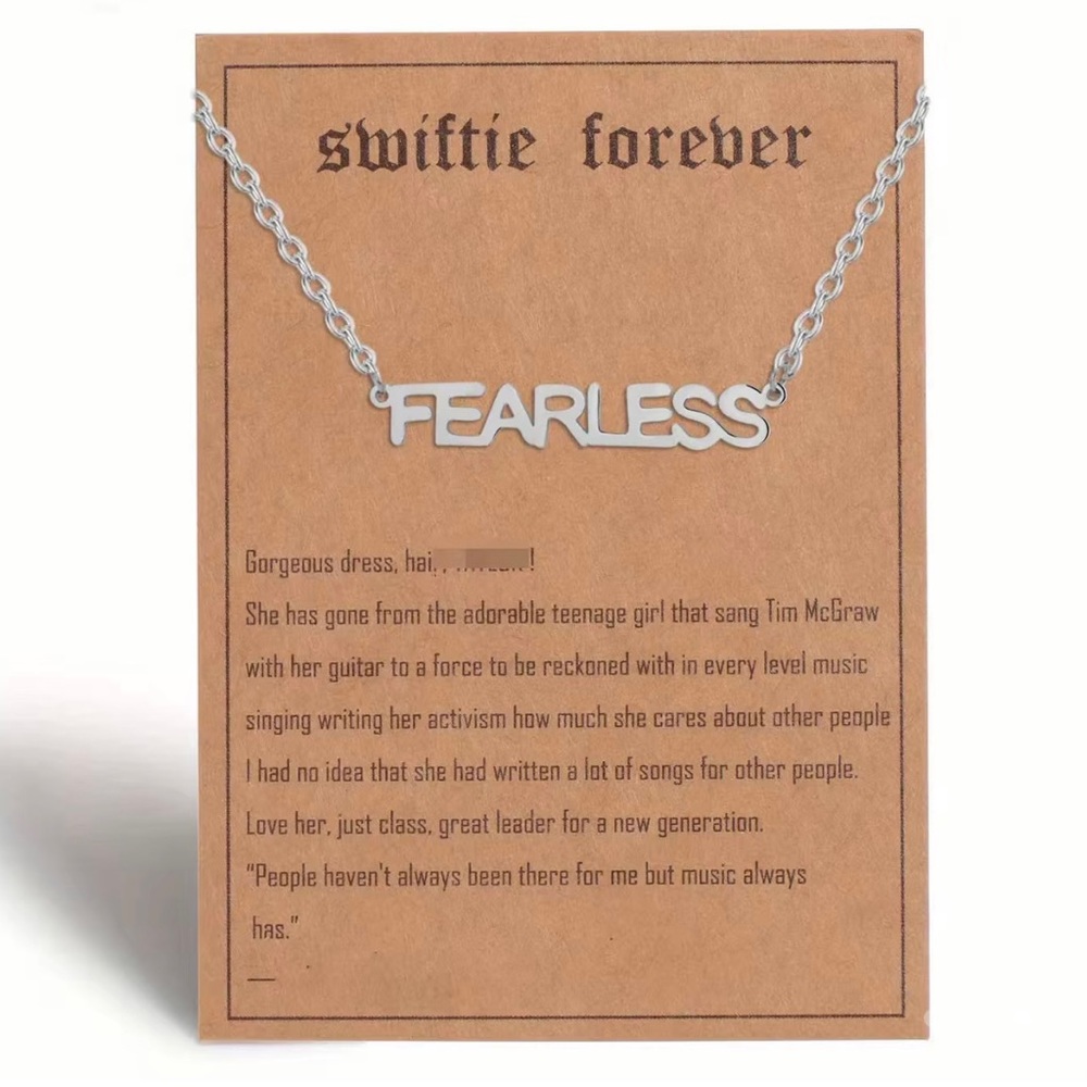 NWOT silver plated fearless necklace